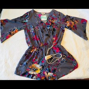 Floral Tassel UMGEE romper!